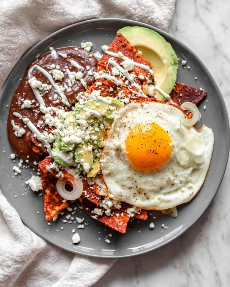 Creamy Green Chilaquiles with Chicken, Eggs, and Avocado Recipe