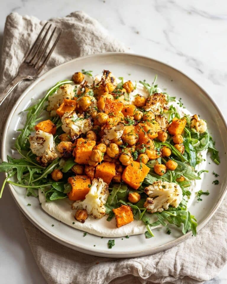 Glow Bowl with Roasted Vegetables, Chickpeas, and Tahini Yogurt Sauce Recipe